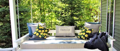 Enjoy napping and reading the afternoon away on the porch swing.