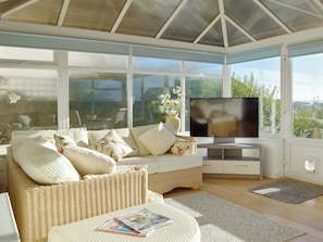 Bright and spacious sun/ dining room | Sweet Pea Cottage, Pwll, near Llanelli