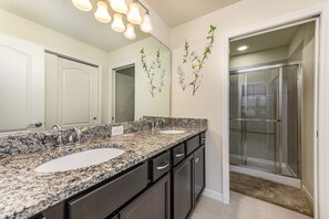 Stunning double sink vanity with sliding glass shower