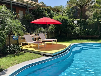 Private & spacious family retreat with aircon & pool.