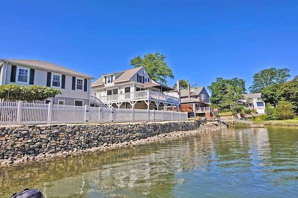 View of the house (with the awning) from the river.