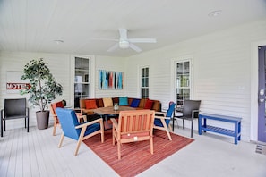 The screened porch is a wonderful place to gather and relax.