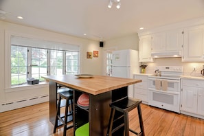 Eat-in kitchen with island seating.