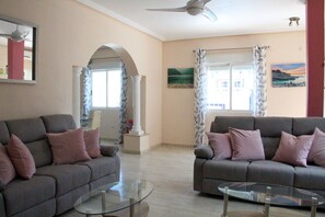 Living room with full nationality TV and FREE wifi