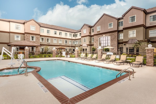 Take in gorgeous views while lounging around the on-site outdoor pool.