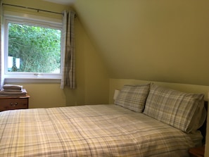 Welcoming double bedroom | Thistle Lodge - Flowerburn Holidays, Rosemarkie, near Fortrose