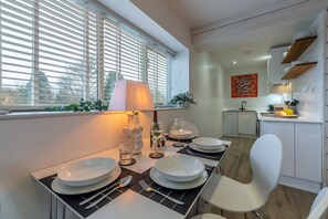 Wheelwrights, Sustead: Dining area with kitchen beyond