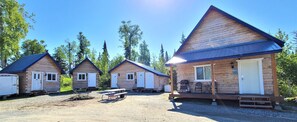 From left to right, Bear Cabin, Wolf Cabin, Wash-house, Moose Cabin