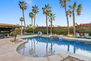 The water slide and large tanning shelf are perfect for those bringing little ones.