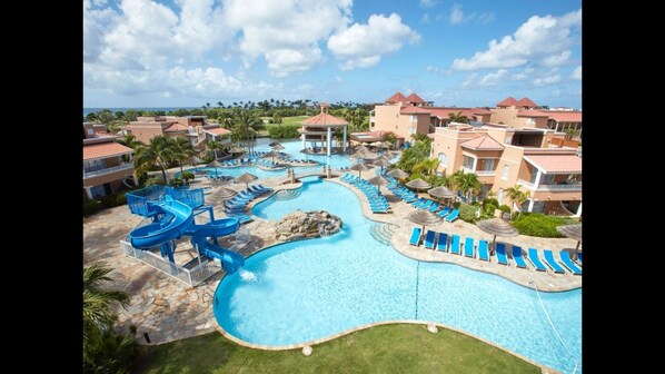 Main Pool With Water Slide & Swim Up Bar