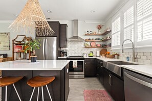 Fully Stocked Kitchen with Island Seating for 4