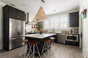 Fully Stocked Kitchen with Island Seating for 4