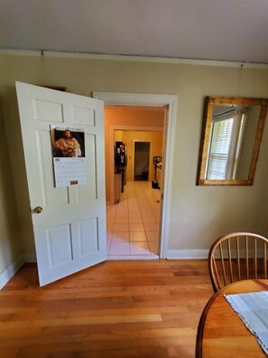 The Dining room leads to the nook, Bedrooms 1, 2 and the kitchen