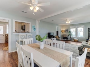 Dining table with kitchen in background