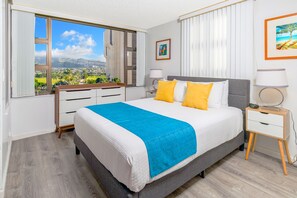 Bedroom with a queen-size bed and beautiful Mountain views from the window