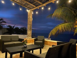 Casa Saltwater Cowboy features several outdoor seating areas.