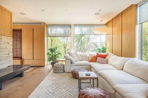 Living area with oversized RH Cloud sofa.