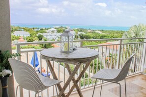 Petit dining table in your private balcony! Enjoy those sunsets and sunrises.