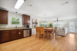 View from Entry into Kitchen, Dining, Living Area