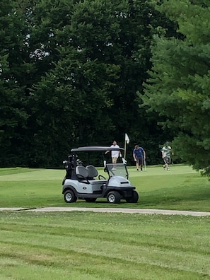 Watch golfers from the back patio. 