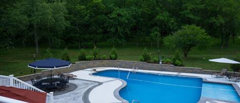 Gorgeous pool area with lots of seating and ready for you to relax! 