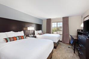 Relax on the comfy Queen bed after a day outside.