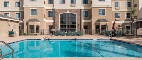 Spend time with family and friends in the outdoor pool during the summer.