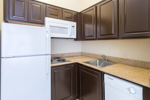 The fully-equipped kitchen features all the amenities you'd need to make a delicious meal.