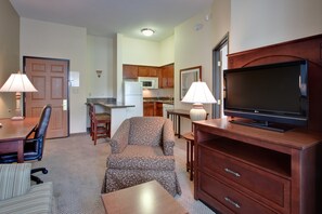 Take a seat in front of the fireplace and enjoy a movie in the living area.