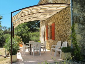 Plant, Property, Furniture, Table, Chair, Shade, Outdoor Furniture, Outdoor Table, Architecture, Flowerpot