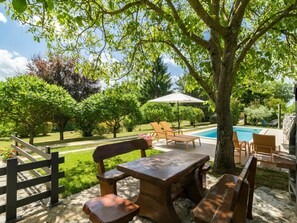 Plant, Table, Sky, Tree, Shade, Outdoor Furniture, Outdoor Table, Cloud, Wood, Building