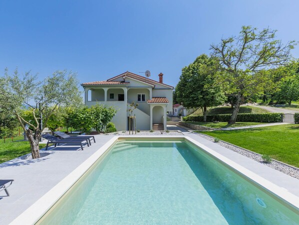 Water, Sky, Plant, Building, Swimming Pool, Azure, Tree, House, Shade, Residential Area