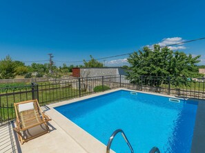 Sky, Water, Plant, Swimming Pool, Azure, Cloud, Tree, Shade, Outdoor Furniture, Grass