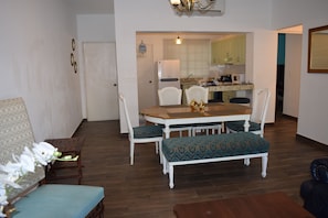Open concept kitchen, dinning table for 6 people and living room
