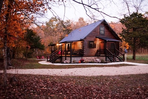 A fall evening in the warm glow of the porch lights and setting sun.