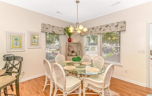 Seating for 8, including the 2 bar stools at high top counter to the left