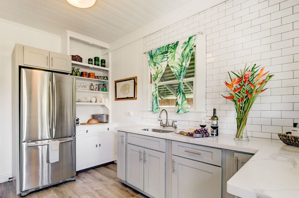 White and grey kitchen of a family rental in Waimea Kauai