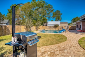 Enjoy gas grilling out by the pool & grill has its own area away from the kids. 