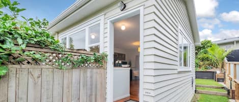 Hidden up the garden path is this charming cottage that keeps its cards to itself.
