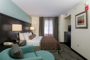 Get a peaceful night sleep in our cozy bedroom which has 1 Queen bed.