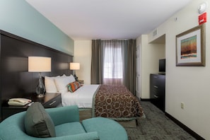 Get a peaceful night sleep in our cozy bedroom which has 1 Queen bed.