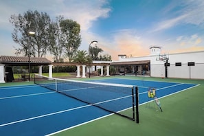 Enjoy the best of both worlds with a tennis court and basketball court at Casa Palacio.