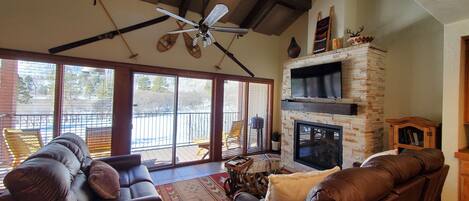 Living Room with Fireplace and Big Deck - Living Room with Fireplace and Big Deck