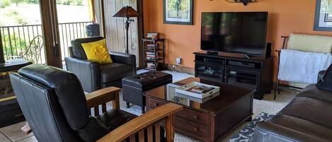 Living Room with Large Deck and Fireplace