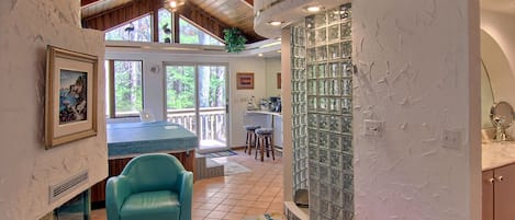 Gas fireplace, glass block marble shower, wet-bar and Jacuzzi.