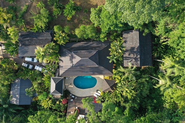 Main house is compose of 3 casitas, main space and is surround by rainforest .