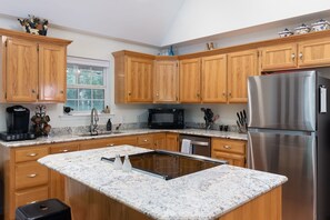 Kitchen with bar seating for 3