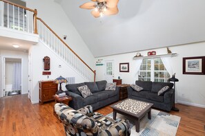 Living room with cathedral ceilings