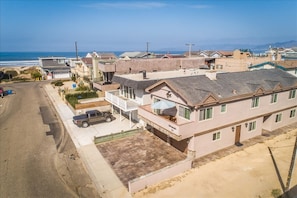 Aerial view of house and proximity to beach and ocean