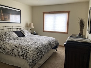 Master bedroom with king sized bed